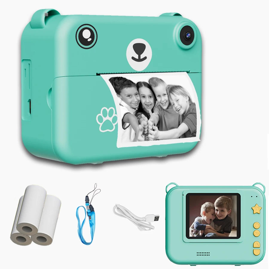 Kids instant print camera in water green with thermal paper rolls, lanyard and USB cable