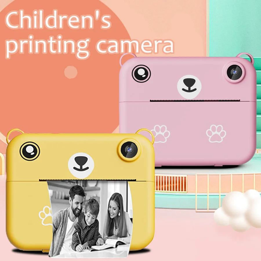 Kids instant print camera in purple with thermal print paper rolls, lanyard and USB cable