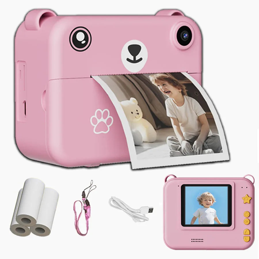 Kids instant print camera in cute pink with thermal paper rolls, lanyard and USB cable