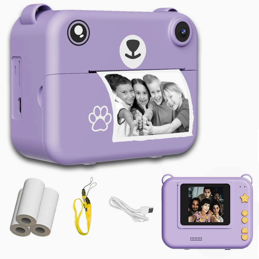 Kids instant print camera in purple with thermal print paper rolls, lanyard and USB cable